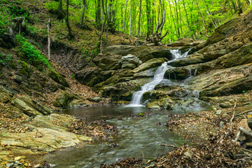 Beautiful waterfall deep in the forest.