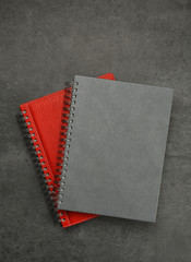 Group of note pad, diary, ring binder on desk