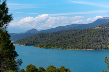 Fototapeta na wymiar View of the Shrine of Torreciudad from El Grado dam, Aragon, Spain