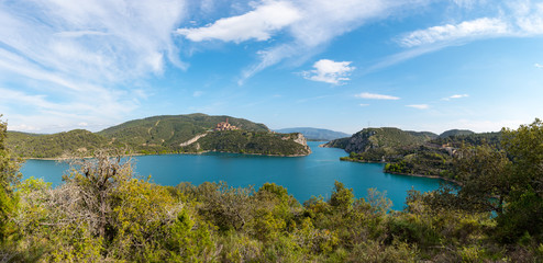 Fototapeta premium View of the Shrine of Torreciudad from El Grado dam, Aragon, Spain