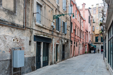 Fototapeta na wymiar Typical Venice street with canal