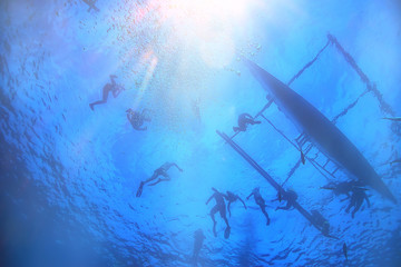 sun rays scuba reef / blue sea, abstract background, sunny day, rays in water