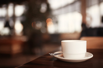 English tea in a cafe / cup and kettle with five o'clock tea