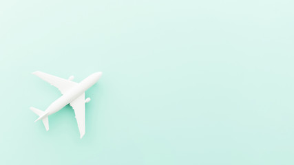 Obraz premium Small toy plane on blue table