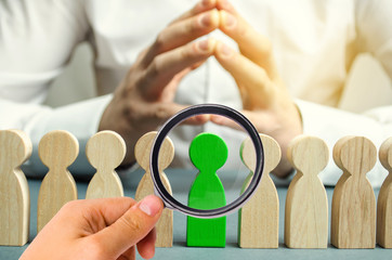 Fototapeta premium The leader chooses the person in the the team. Talented worker. Hiring staff. Employee search. Promote. Human Resource Management. Choosing a new leader in the team. Dismissal. Successful choice.