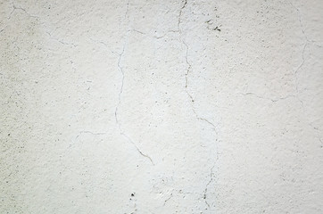 cracked and aged gray wall background