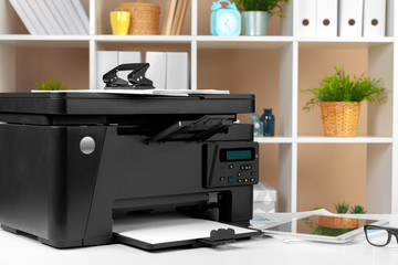 Printer, copier, scanner in office. Workplace.