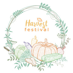 Wreath of twigs and leaves with vegetables. Harvest festival. Cabbage, carrots, potatoes, leeks, pumpkin, beets, zucchini, eggplant.