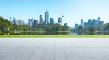 Muurstickers Central Park Empty floor with park and modern cityscape . Morning scene .