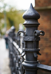 Fototapeta premium Ancient church exterior.Metal railing