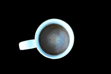 cup of coffee on black background