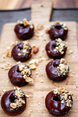 Baked chocolate Donut with Glaze and Nuts 