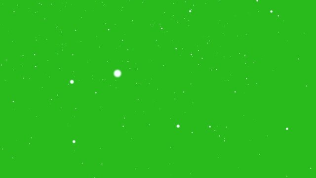 Falling small snow with the wind blowing on green background 30 sec ,4K video