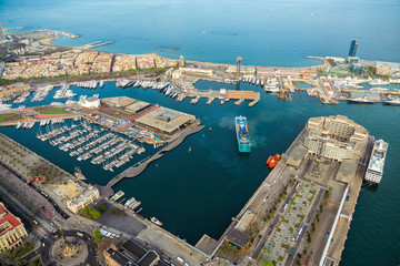 Fototapeta na wymiar Aerial view of Barcelona Port, marina with boats and seafront Mirador Monument, Spain