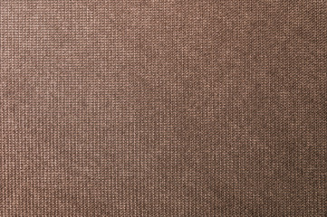 Fototapeta na wymiar Textured background large brown textile. Texture of textile fabric close-up