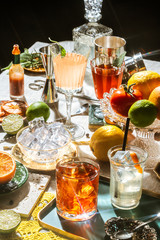 Negroni and other cocktail, in luxury pop style, rich and colorful.