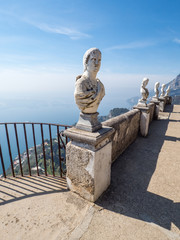 April, 2019: White statues decorate a Terrace of Infinity in Villa Cimbrone above the sea in Ravello, Amalfi Coast, Italy.