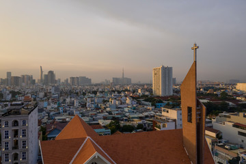 Modern Church Spire against City Scape Sunset