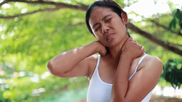 Young woman pain neck , Health Problem And Healthcare Concept