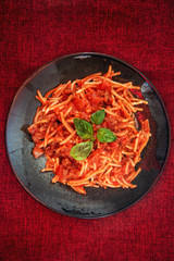 tasty pasta Italian tomato sauce pasta on the table