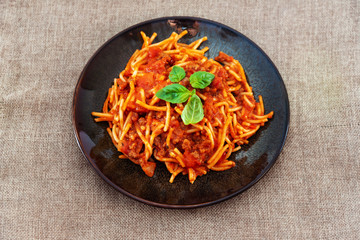 tasty pasta Italian tomato sauce pasta on the table