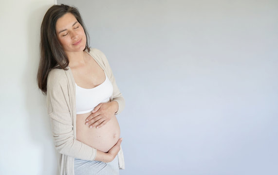 Portrait of 6 months pregnant woman