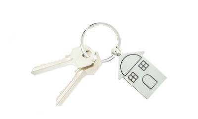 key chain with house symbol and keys on white background,Real estate concept