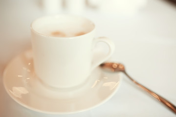 cup of coffee for breakfast in a cafe / serving cup of coffee in modern interior, a European breakfast