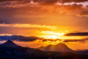 Silhouetted Mountains at Sunset