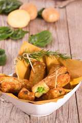 Potato croquettes with spinach and mozzarella.