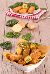 Potato croquettes with spinach and mozzarella.