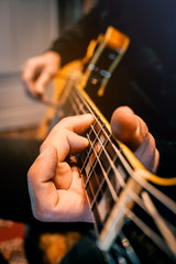 hand playing a guitar and touching a string instrument musician session recording show concert live...