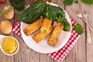 Potato croquettes with spinach and mozzarella.