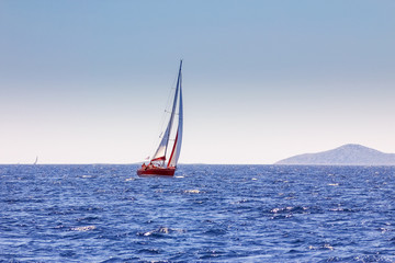 Fototapeta premium Red yacht at sea, regatta. Sailing