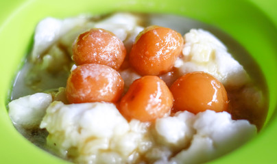 Bubur sum sum on white background. Bubur sum sum is an Indonesian dessert made by cooking rice...