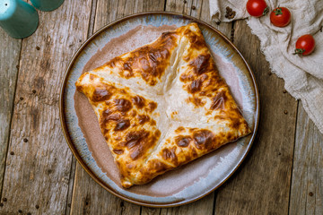 khachapuri layered georgian kitchen on board