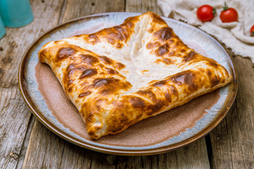 khachapuri layered georgian kitchen on board