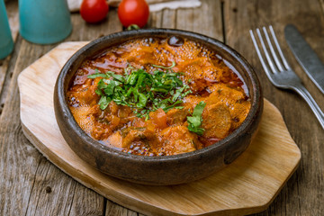 Ojakhuri georgian kitchen on wooden background