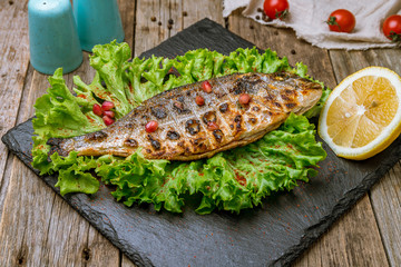 Dorado on grill on board