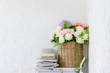 bouquet of flowers in a vase on wooden table