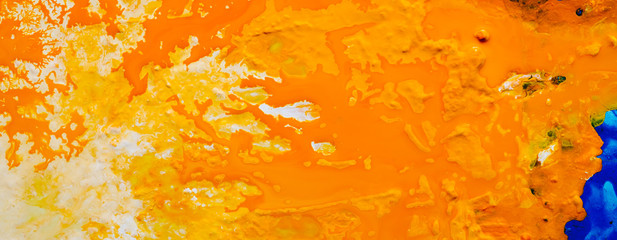 Abstract white yellow orange color background. Acrylic paint liquid fluid mix blend texture pattern. Art effect technique.