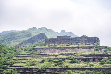 Obraz premium 13-Layer Remains (Remains of Copper Refinery) Aerial View in Yinyang Sea of Shuinandong, Ruifang District, New Taipei, Taiwan.