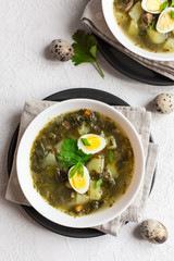 Green Sorrel soup - a soup made from broth, sorrel leaves, spinach, eggs (hard boiled), potatoes, carrots, parsley root. Polish, Ukrainian, Belarusian, Russian, Jewish dish.