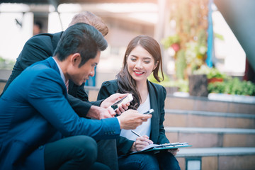 Portrait of Business team meeting on blurred city background. Business meeting and brainstorm concept.