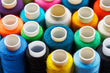 Colorful spools of sewing thread. Colored thread for sewing
