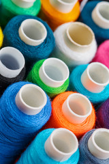 Colorful spools of sewing thread. Colored thread for sewing