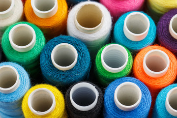 Colorful spools of sewing thread. Colored thread for sewing