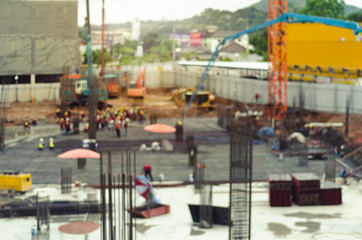 construction building works with automobile concrete pump ,blur image .