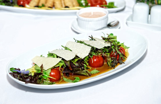 Close-up of a salad with parmesan