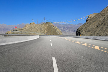 Empty highways and distant mountains